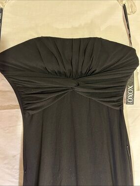 XOXO Black Strapless Twist-Front Maxi Gown. The ULTIMATE little black dress!